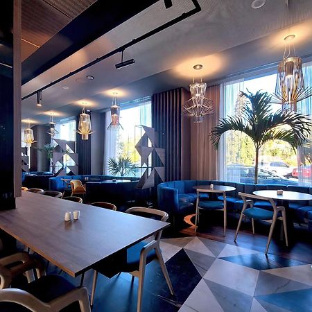 Radisson Blu Aurum Hotel, Брашов Экстерьер фото Restaurant