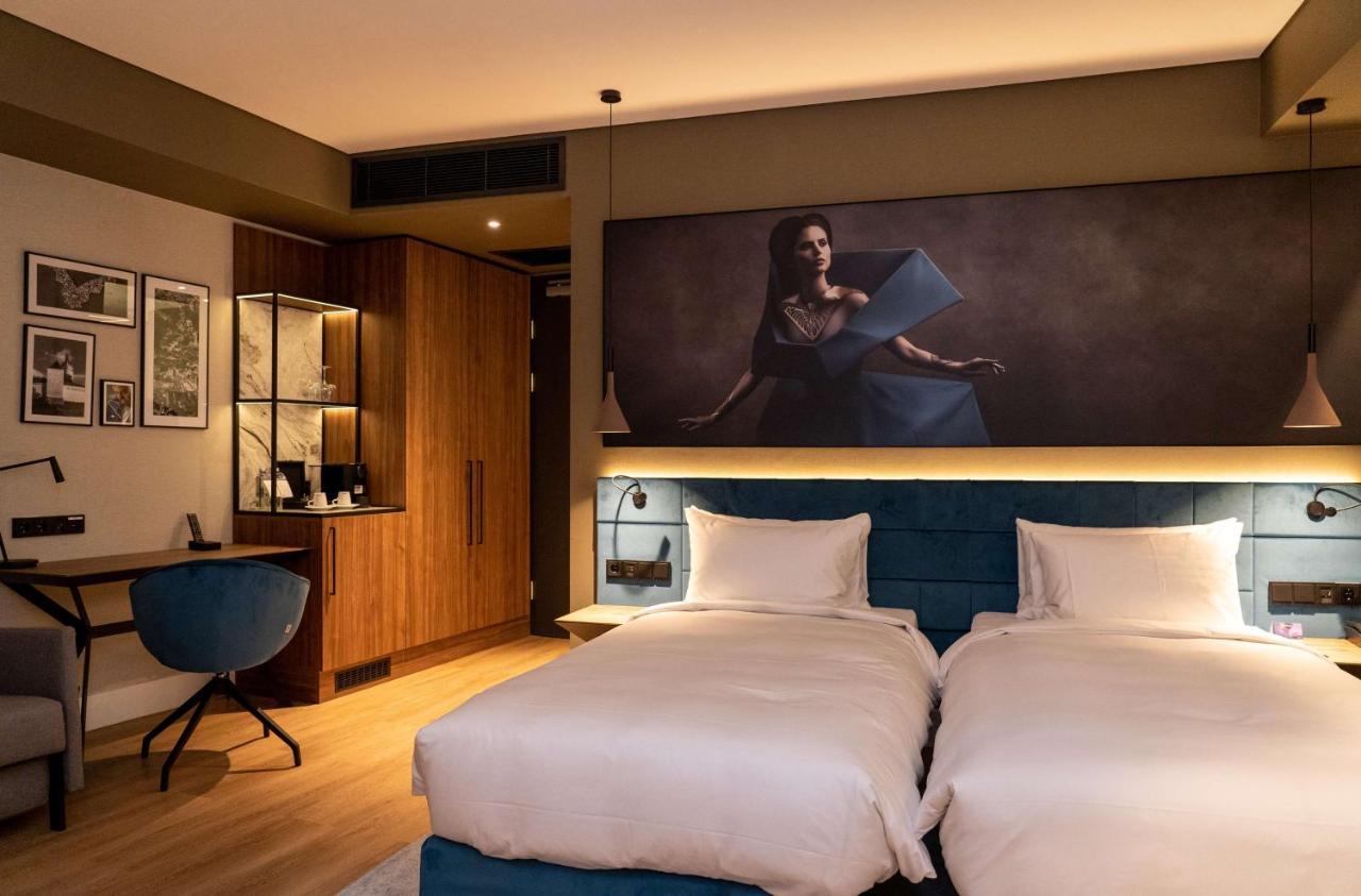 Radisson Blu Aurum Hotel, Брашов Экстерьер фото A room at the hotel