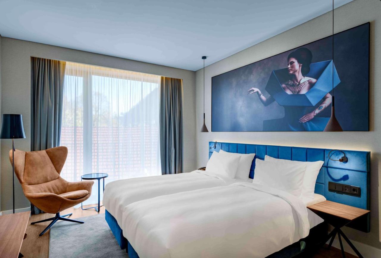 Radisson Blu Aurum Hotel, Брашов Экстерьер фото A room at the hotel