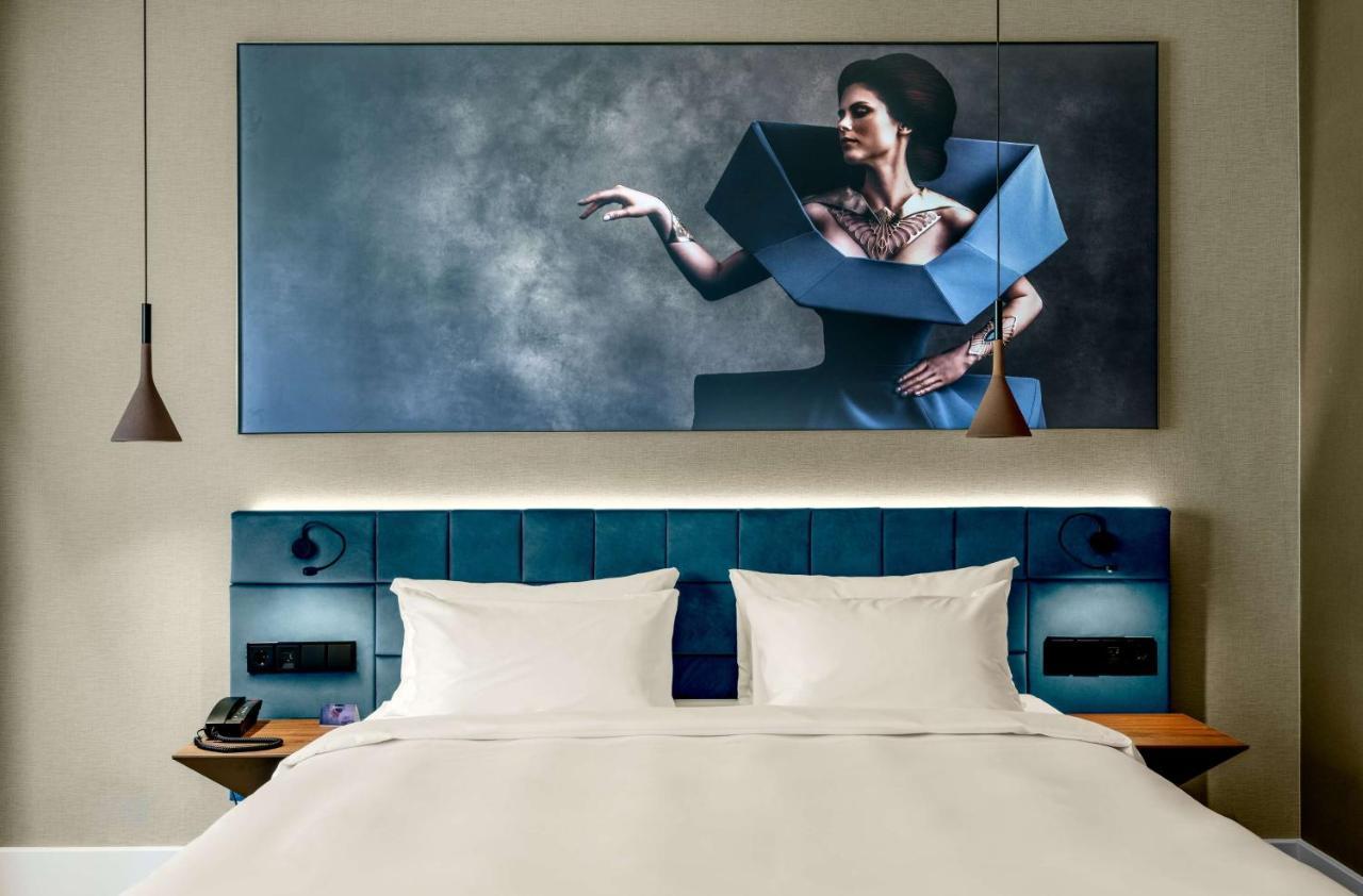 Radisson Blu Aurum Hotel, Брашов Экстерьер фото A bedroom at the hotel
